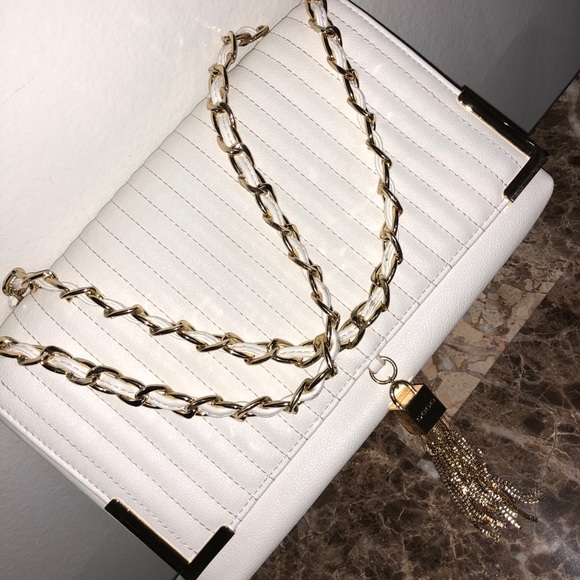 bebe Handbags - White and gold stunning Bebe purse